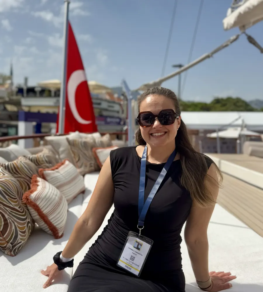 Gabby on the deck of a yacht in Türkiye